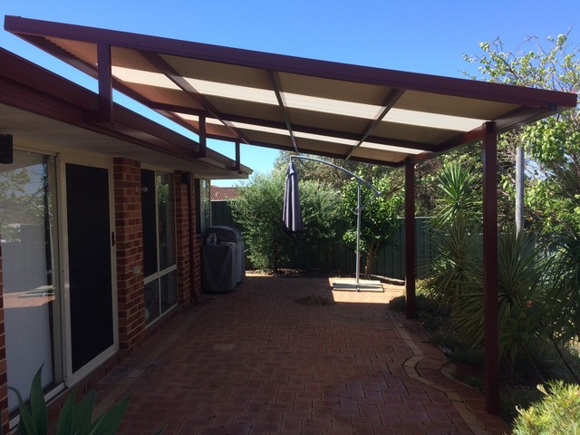 raised flat patio with fly over by great aussie patios