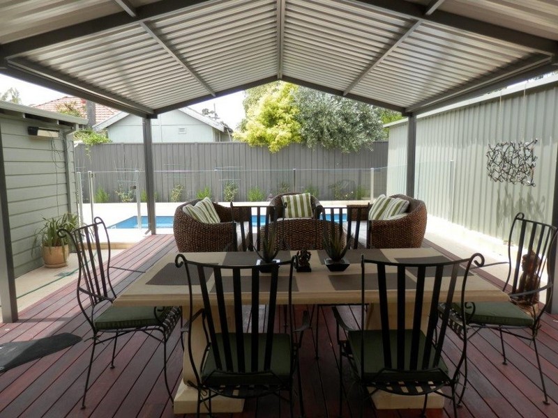 gable patio by great aussie patios with outdoor setting